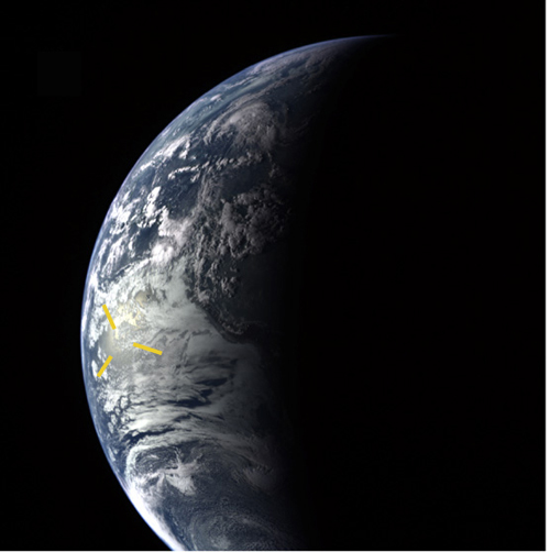 [Picture of crescent Earth from space with glint marked in yellow.  Credit NASA/Johns Hopkins University/Applied Physics Laboratory/Carnegie Institution of Washington ]
